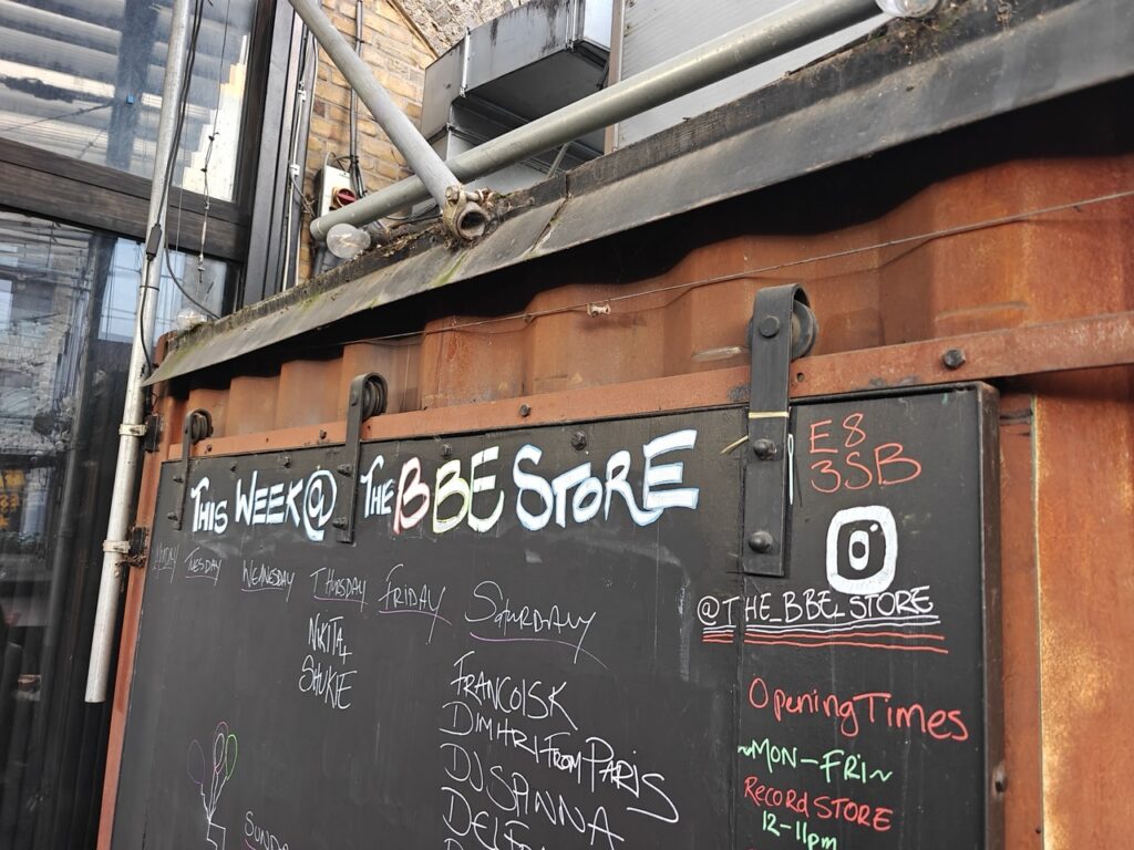 BBE record store party outside sign 80s party