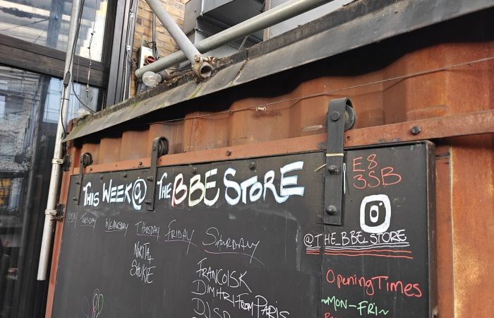 BBE record store party outside sign 80s party